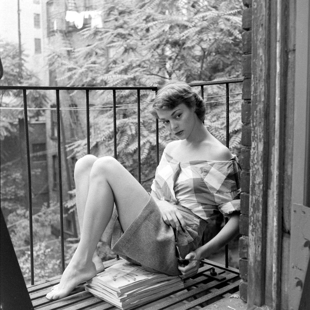#6 Jean Patchett sitting on the terrace, 8 October 1948.