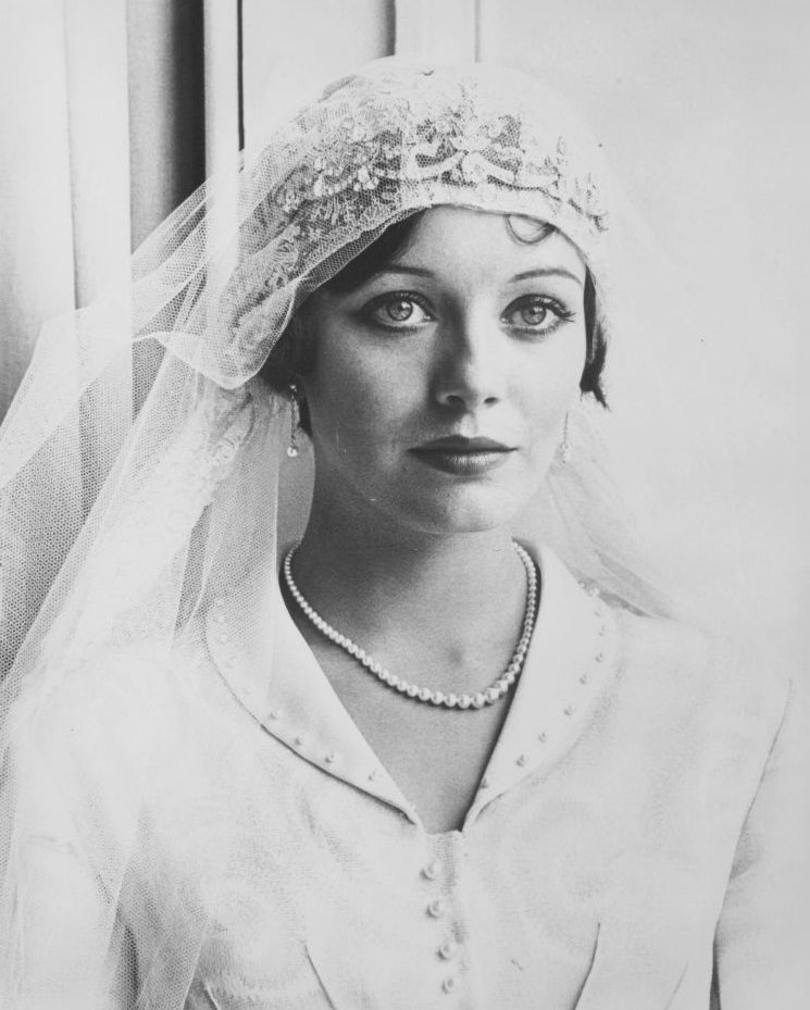 #22 Lesley-Anne Down, in costume as ‘Georgina’ from the television series ‘Upstairs, Downstairs’, December 9th 1975.
