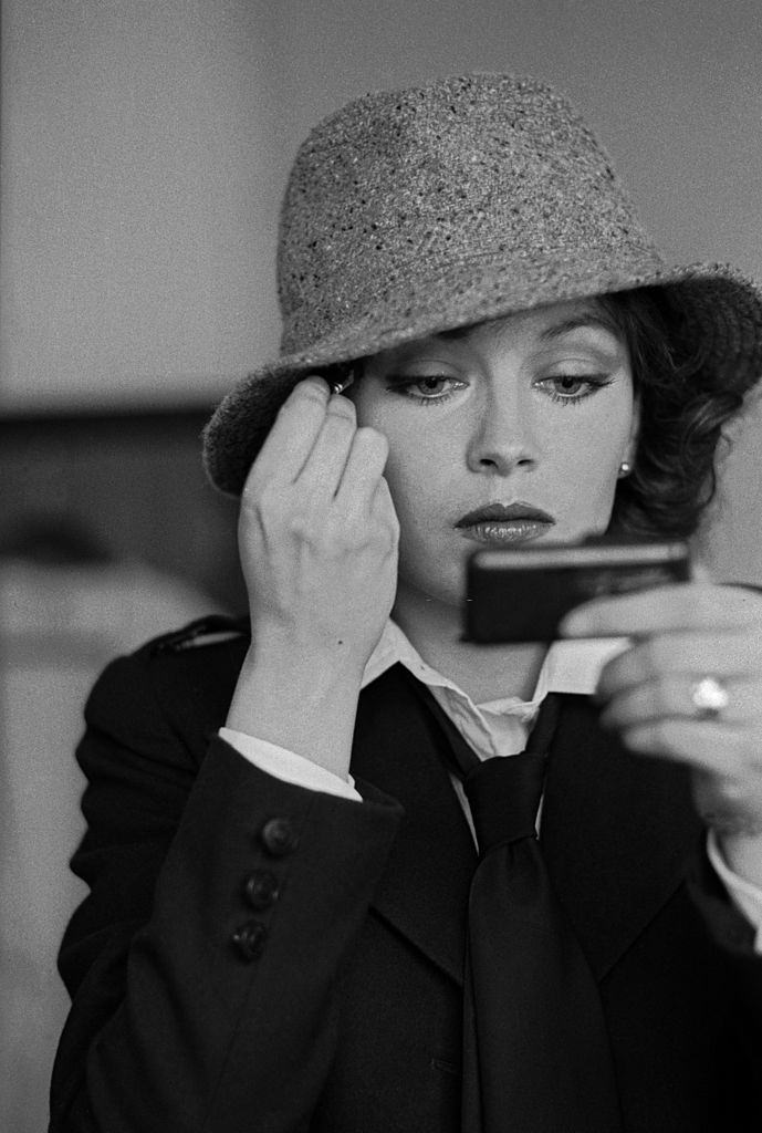 #31 Lesley-Anne Down adjusting her make-up on the set of the wartime drama ‘Hanover Street’, 1979.