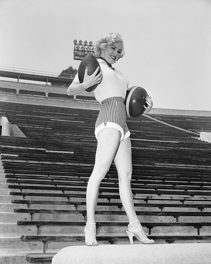 #63 Mamie Van Doren Posing on Bleachers, 1953.