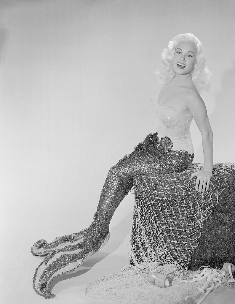 #39 Mamie Van Doren Sitting on Rock in Mermaid Suit, 1957.