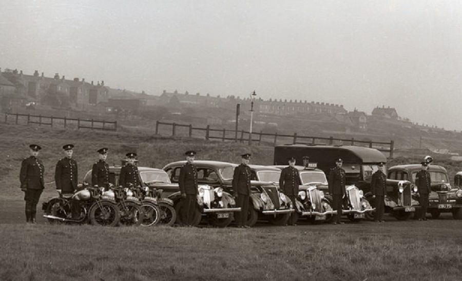 #14 Officers and vehicles of the former Oldham Borough Police stand ready to be inspected by one of Her Majesty’s Inspectorate of Constabulary (HMIC) on the 24rd July 1953