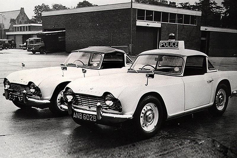 #27 Manchester City Police Triumph TR4 patrol cars in the yard of Longsight Police Station in the mid 1960s.