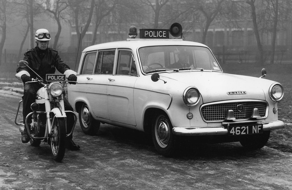 #35 A Standard Ensign estate car and police motorcycle of the Manchester City Police fleet in 1962