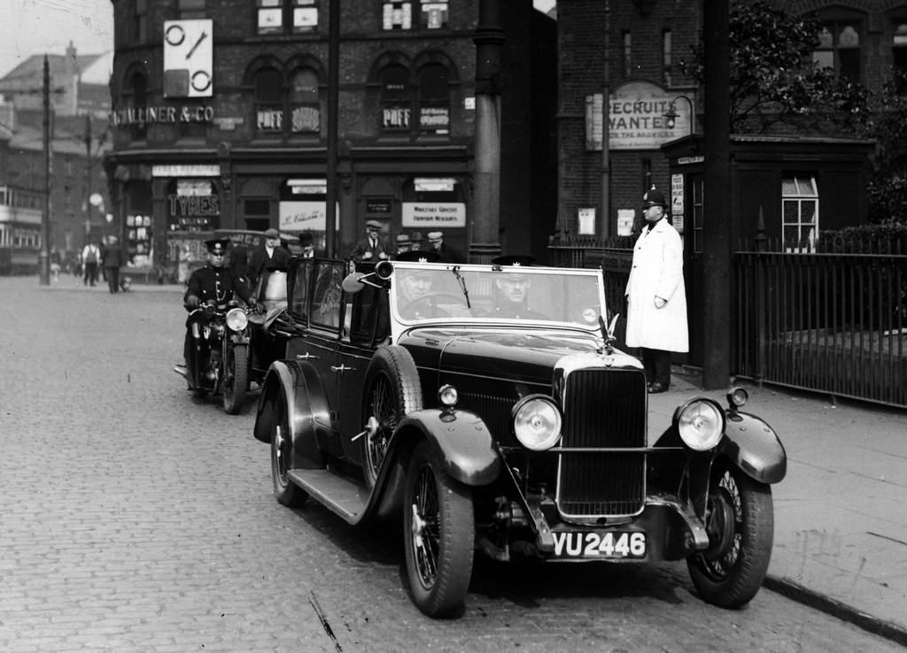 #5 A Manchester City Police Alvis patrol car along with a motorcycle and sidecar in 1930s