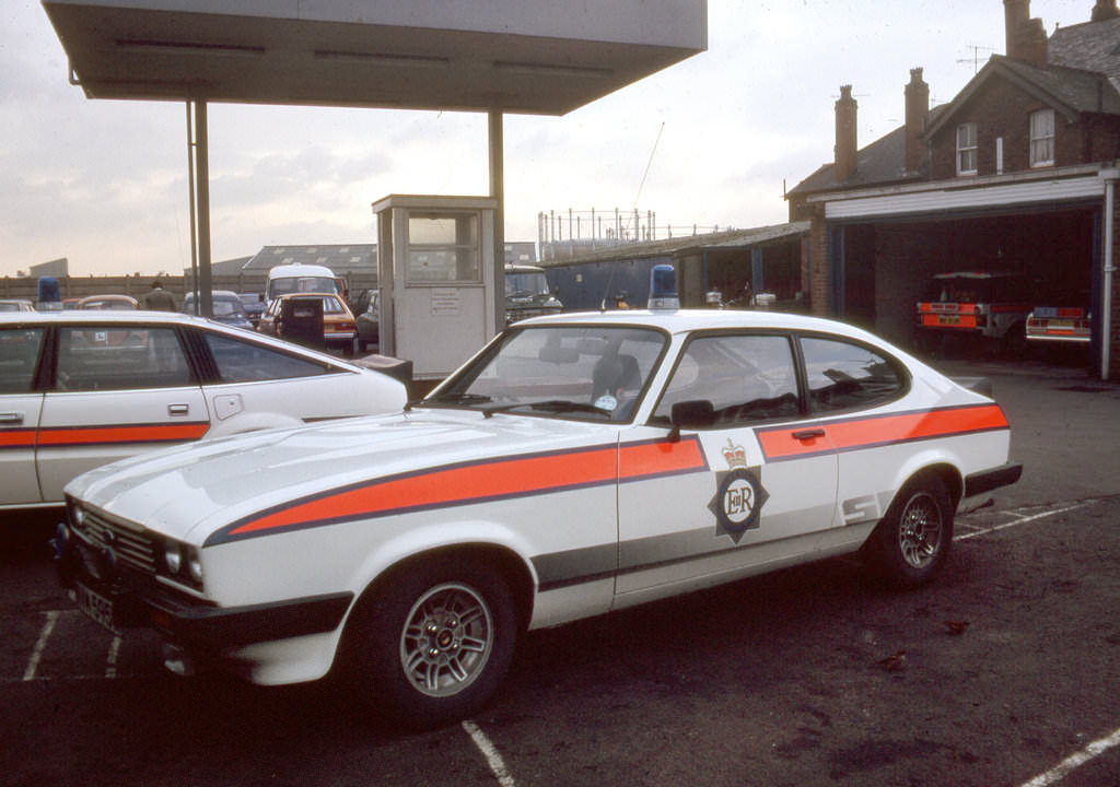 #58 A Ford Capri sits in the yard of the Crescent Police Station in Salford in the late 1980s