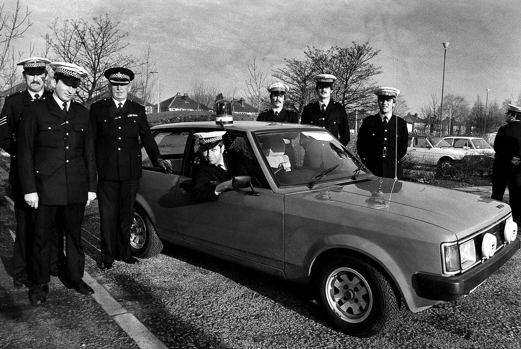 #60 Greater Manchester Police officers with the Sunbeam-Talbot, 1980