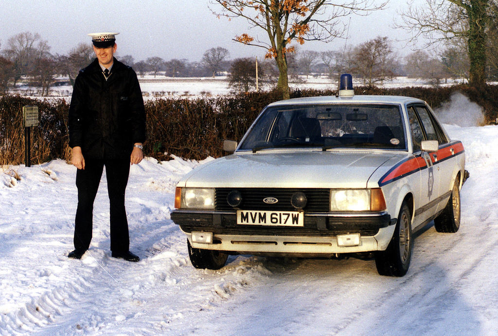 #62 Police officer with his Ford Granada in the early 1980s