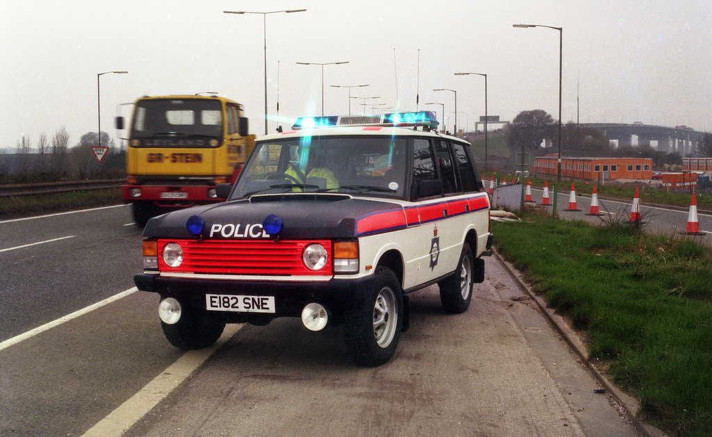 #66 A Greater Manchester Police Range Rover attends the scene of an incident near Barton Bridge in 1988