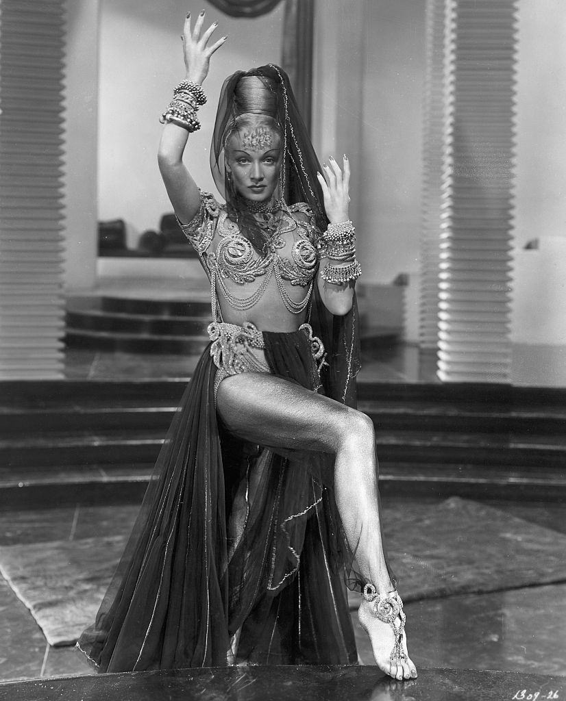 #50 Marlene Dietrich Dressed As Harem Queen in the movie ‘Kismet’.