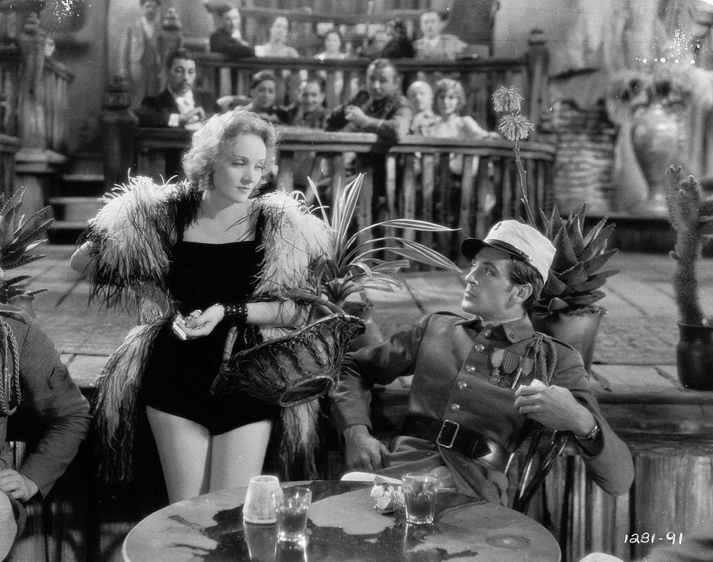 #60 Marlene Dietrich with Gary Cooper in the movie ‘Morocoo’, 1930