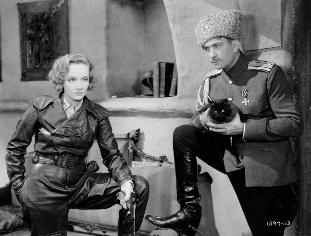 #18 Marlene Dietrich as Marie Kolverer and Victor McLaglen as Colonel Kranau in a scene from the film ‘Dishonoured’, 1931.
