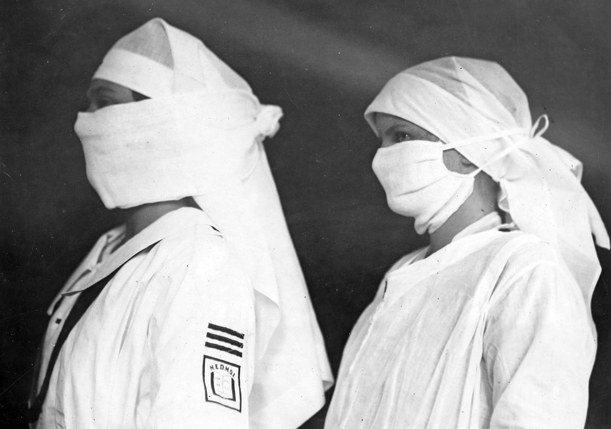 #8 Nurses in Boston wearing masks to contain influenza in the spring of 1919.