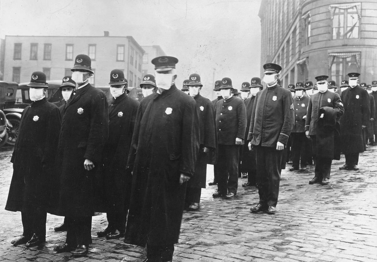 #14 Policemen in Seattle, Washington, wearing masks made by the Seattle Chapter of the Red Cross, during the influenza epidemic.