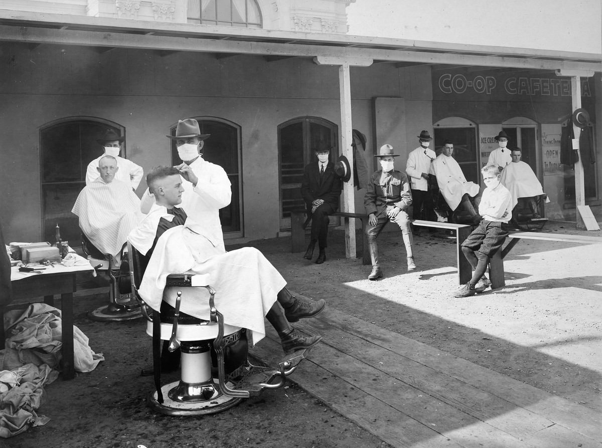 #19 Open air barber shop during influenza epidemic. University of California, Berkeley, California, 1919.