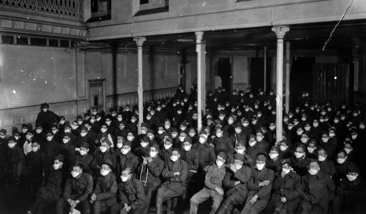 #11 U.S. Army Hospital Number 30, Royat, France: Patients at moving picture show wearing masks because of an influenza epidemic.