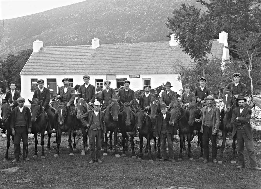 #14 Men on horseback in front of Kate Kearney’s Cottage in Kerry, 1900.