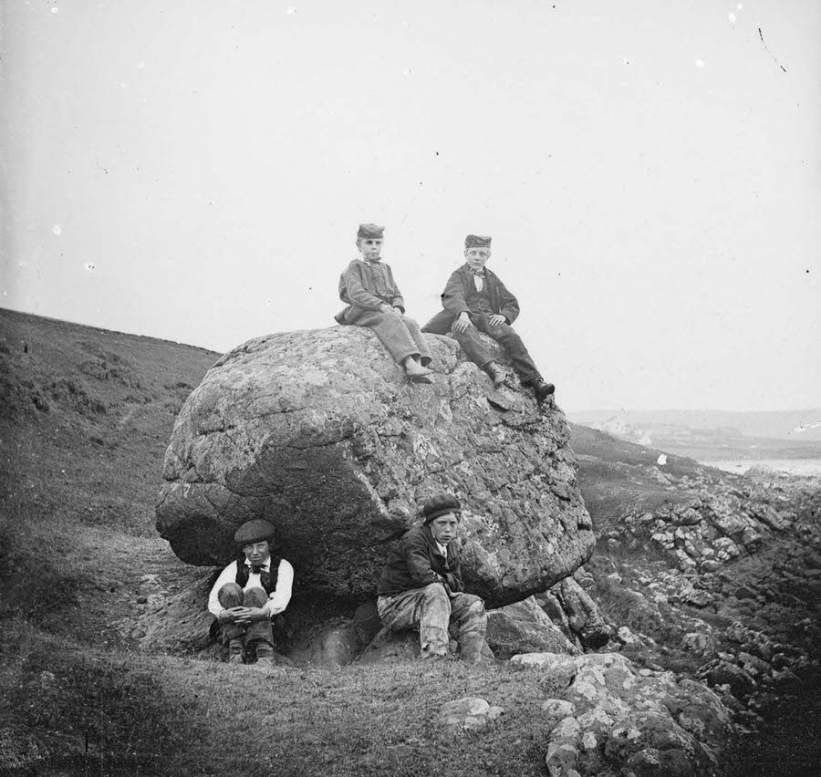 #2 Four boys at the “Rocking Stone” at Islandmagee, County Antrim. 1870.
