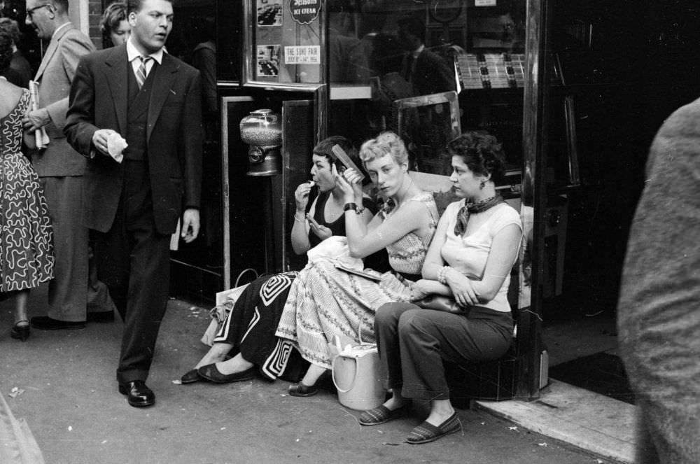 #13 A group of young women ‘hanging out’ on the streets of Soho, London in 1956.
