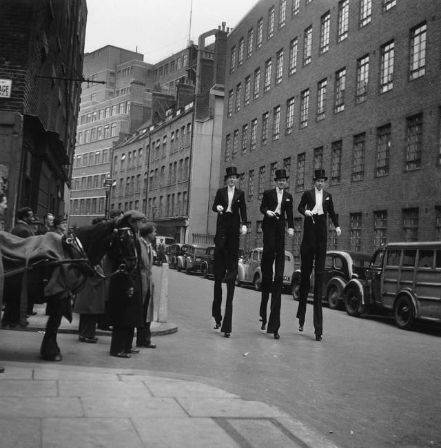 #14 A view down along the shops, cafes and bars from the junction of Old Compton Street and Frith Street in London’s Soho in 1959.