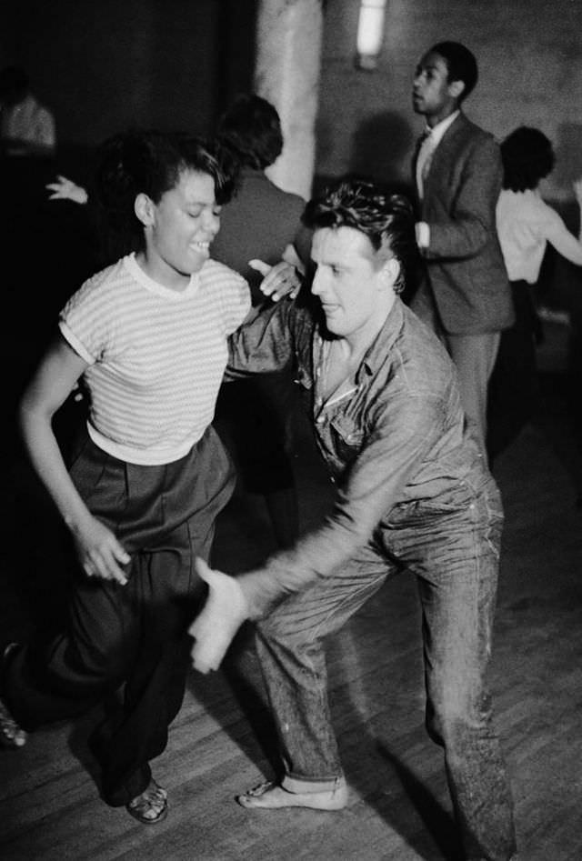 #18 A couple dancing at jazz club the Blue Heaven, 1954.