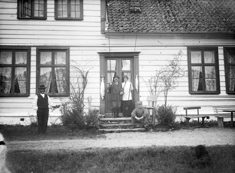 #37 The bailiff’s farm, Bruland. Ludvig August Kjær and Magdalene Beyer posing with their catch of the day