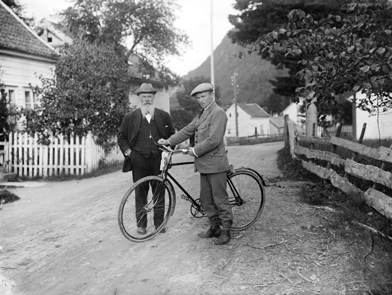 #47 Three men photographed in the street outside photographer Olai Fauske’s home and studio in Førde