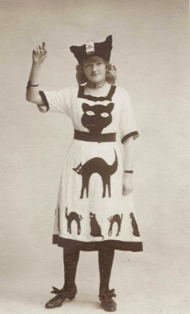 #29 Little girl dressed to advertise Black Cat cigarettes