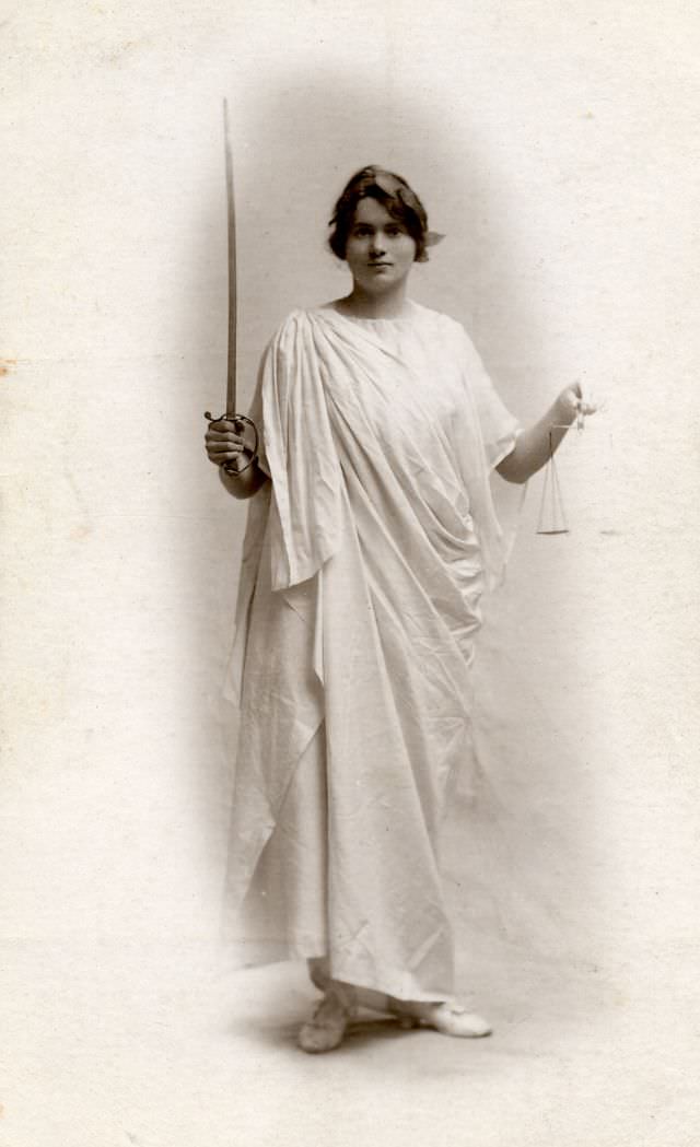 #45 Young woman photographed by the Curzon Studios in London as Justice
