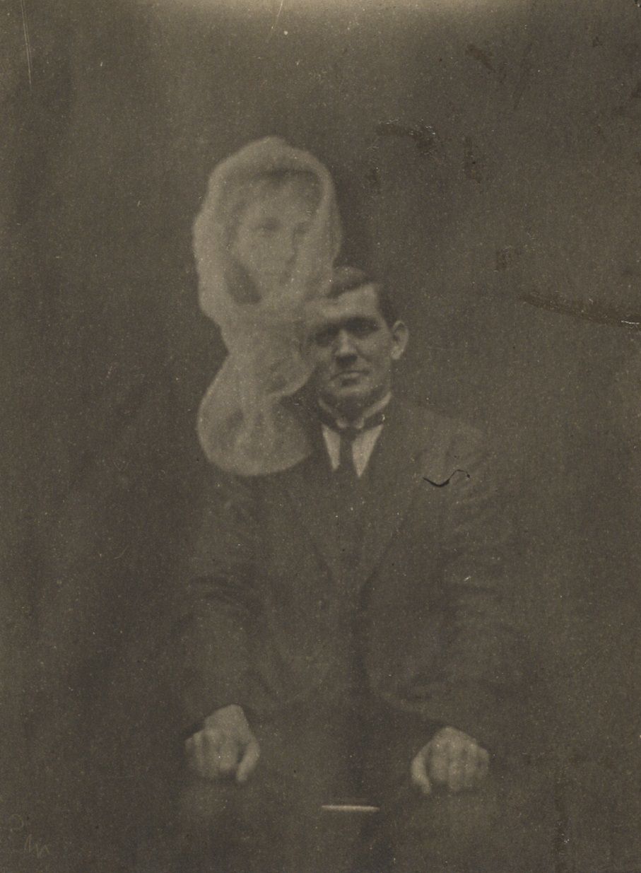 #8 A shrouded woman’s face appears above Welsh medium Joe Thomas.