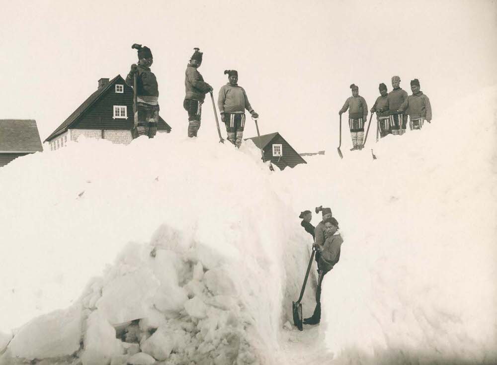 #12 Residents clear snow in the town of Nuuk, 1890s