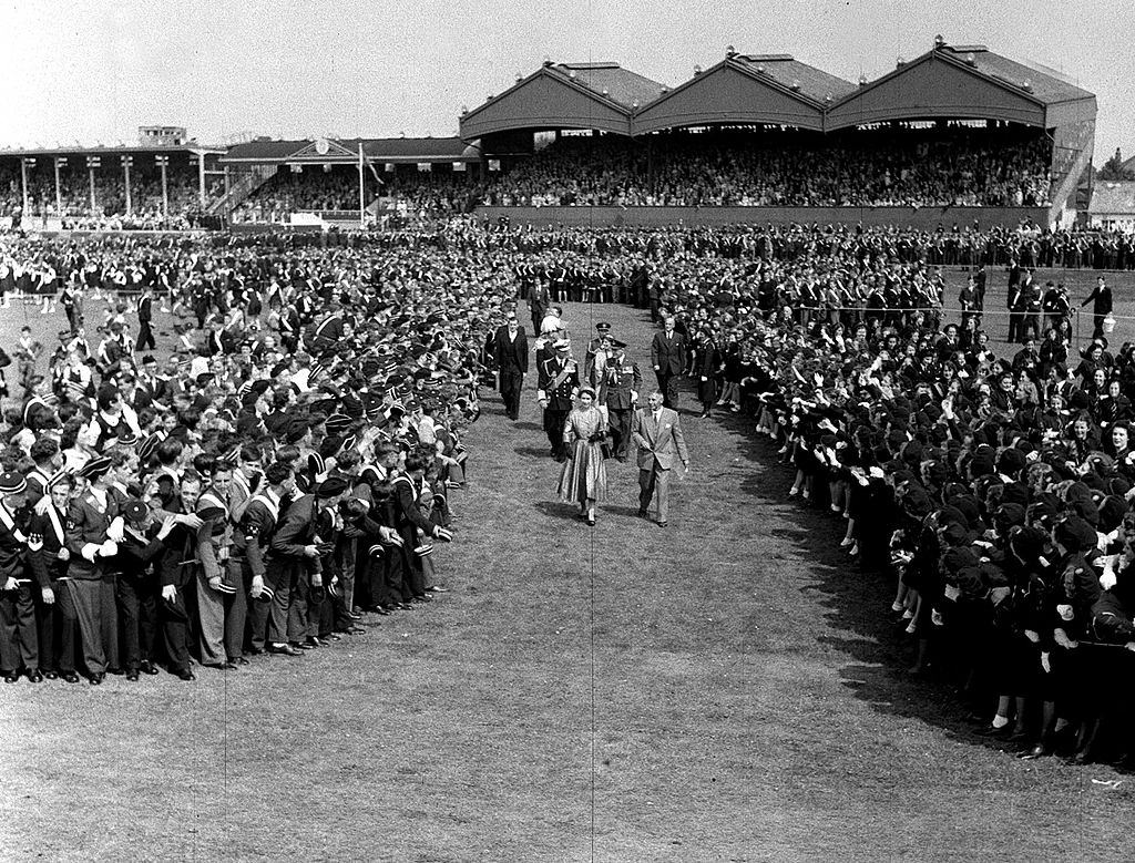 #16 Queen Elizabeth II passes through the thousands of Ulster Youth Organisations at Balmoral, Belfast, 1953.