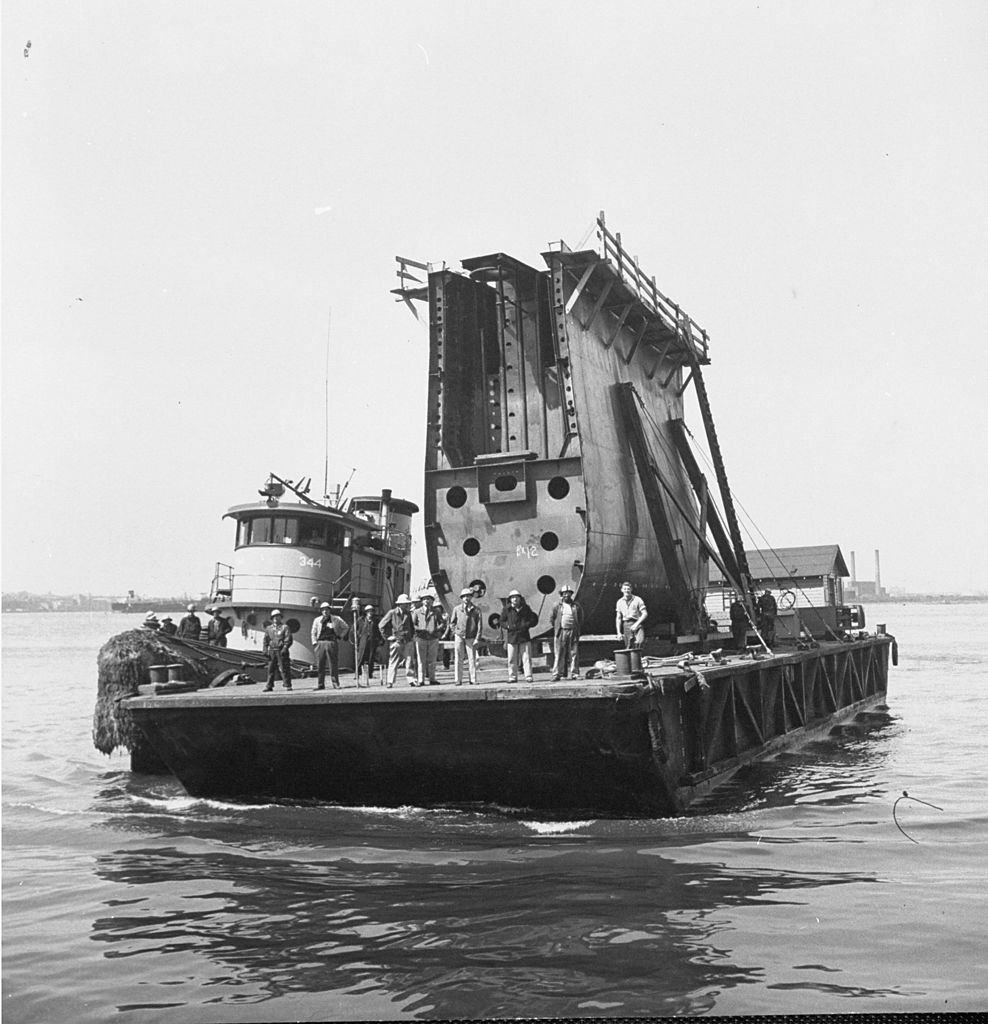 #32 Ferrying bow taken from the Hornet barge bringing Wasp’s new front from Brooklyn to Bayonne, 1952.