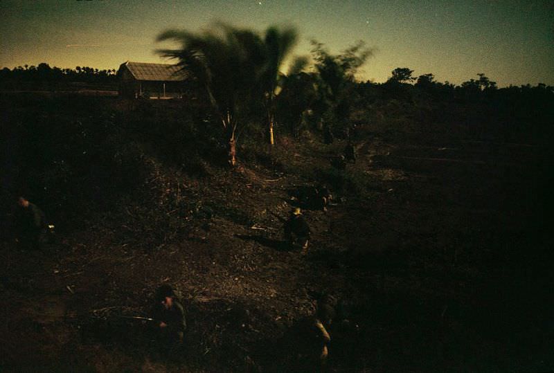#63 Members of a home guard patrol their neighborhood at night in Saigon, 1965