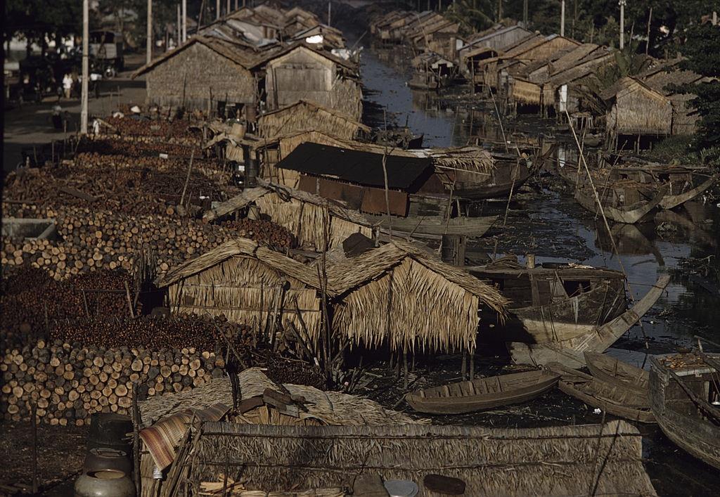 #43 House with walls and roofs of leaves in Cholon, 1961.