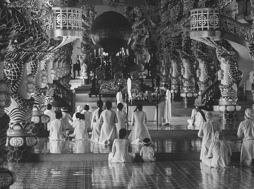 #32 Worshippers inside temple, 1961.