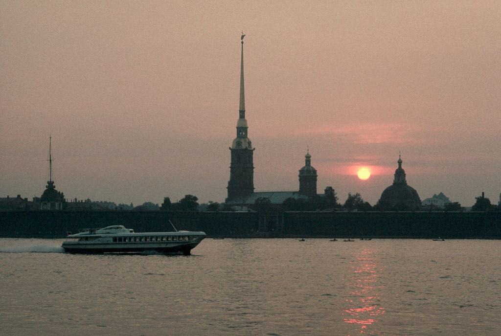 #13 A passenger boat cruises along the Neva River on a white night in Leningrad, 1972.