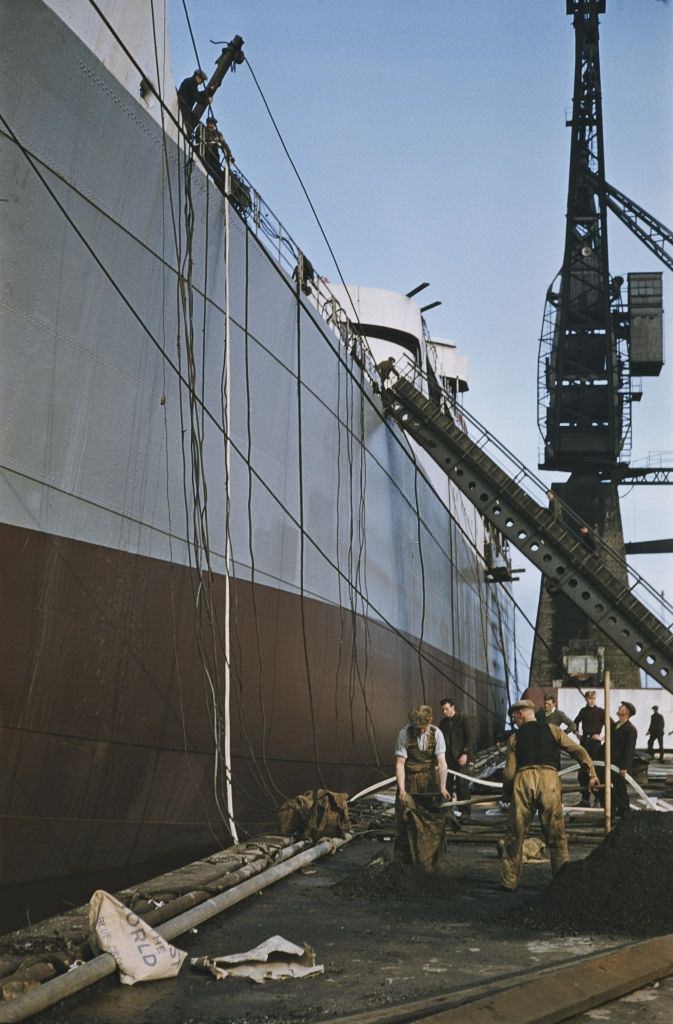 #24 The cargo ship Port Melbourne under construction at the Harland & Wolff shipyard in Belfast, 1955.