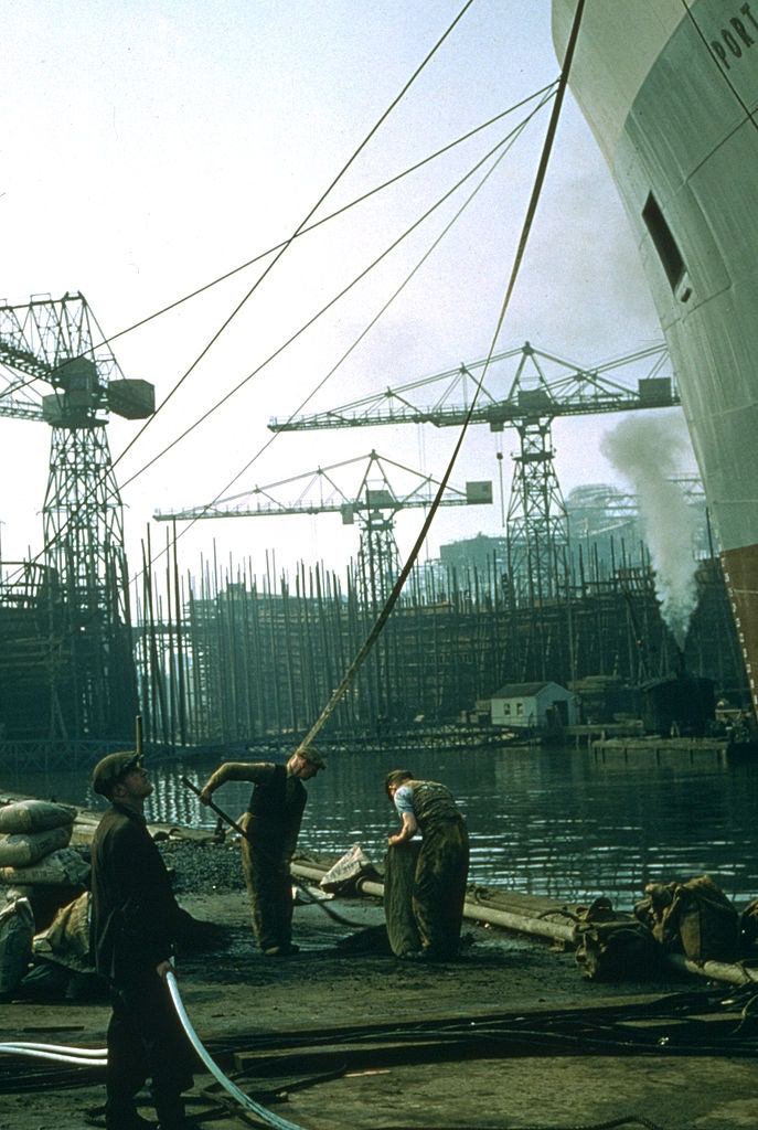 #29 Workers at a Belfast shipyard, 1955.