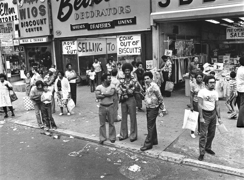 #1 People on a crowded Brooklyn sidewalk, 1977.