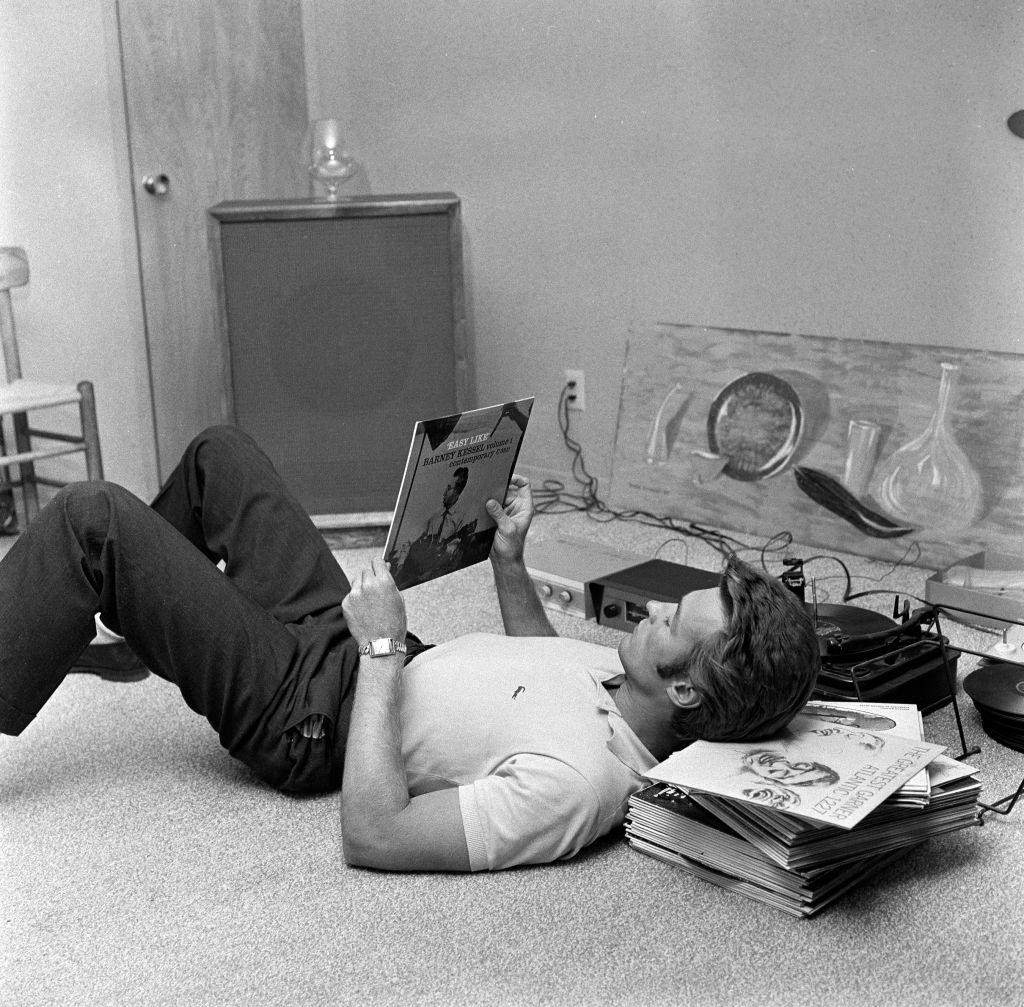 #14 Clint Eastwood listens to records at his home, 1959.