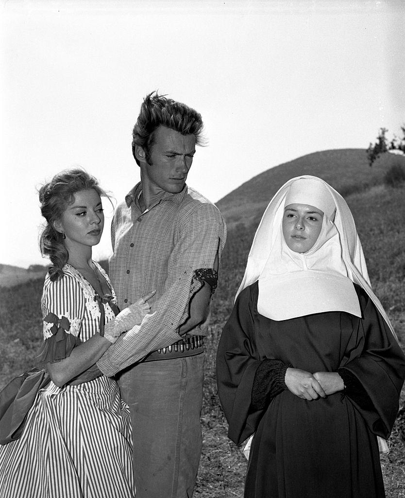 #31 Clint Eastwood as Rowdy Yates and Gigi Perreau as SisterJoan, right and Carolyn Huges as Emerald Carney, 1960.