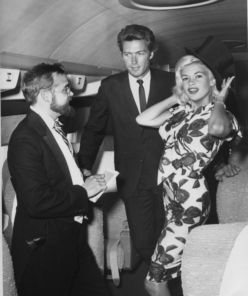 #37 Clint Eastwood and Jayne Mansfield greeted by local artist Bob McClay, 1962.