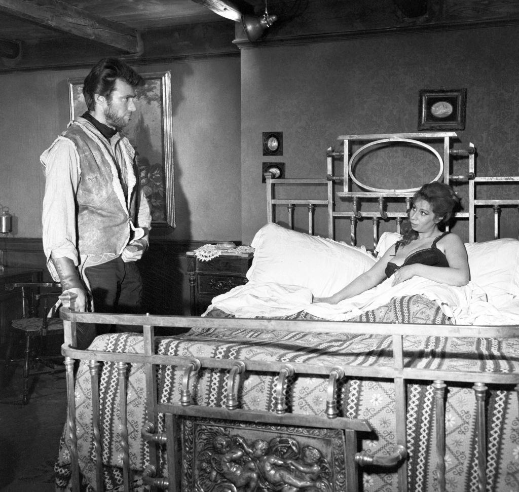 #45 Clint Eastwood with Mara Krupp in a scene from the film ‘For a Few Dollars More’, 1964.