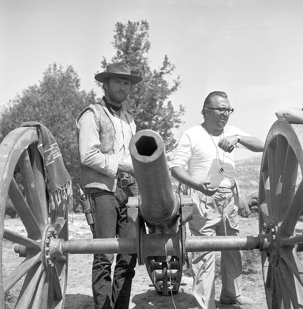 #49 Clint Eastwood and Sergio Leone on the film set of ‘The Good, the Bad and the Ugly’, 1966.