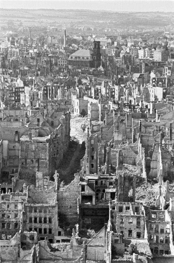 Town Hall tower over destroyed houses to the Annenkirche in Dresden, 1945.