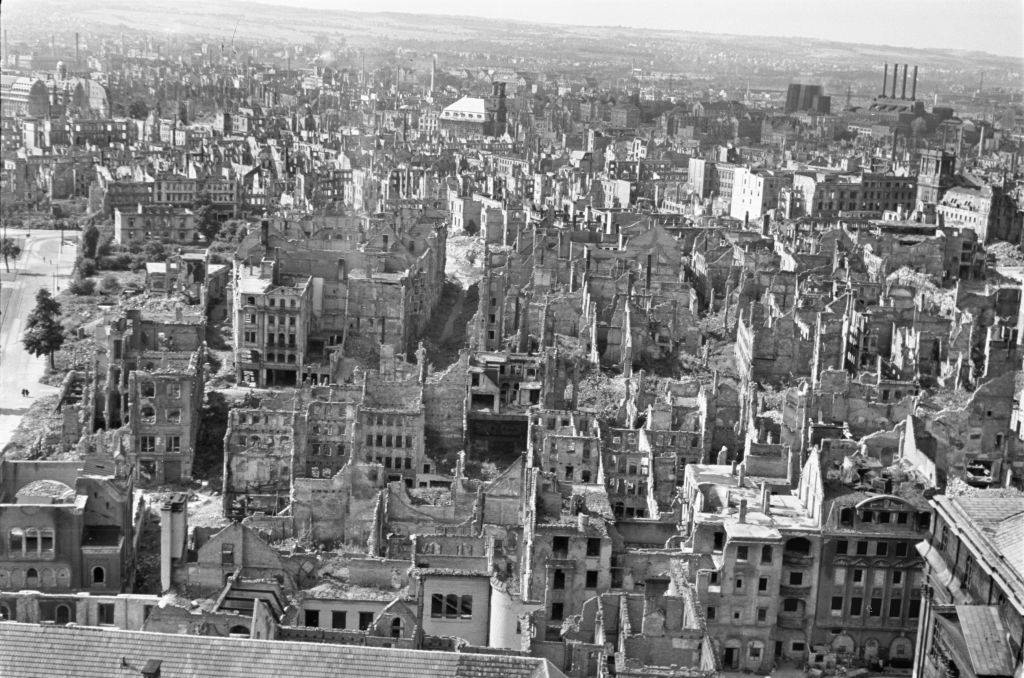 Town Hall tower overlooking destroyed apartment buildings, 1945.