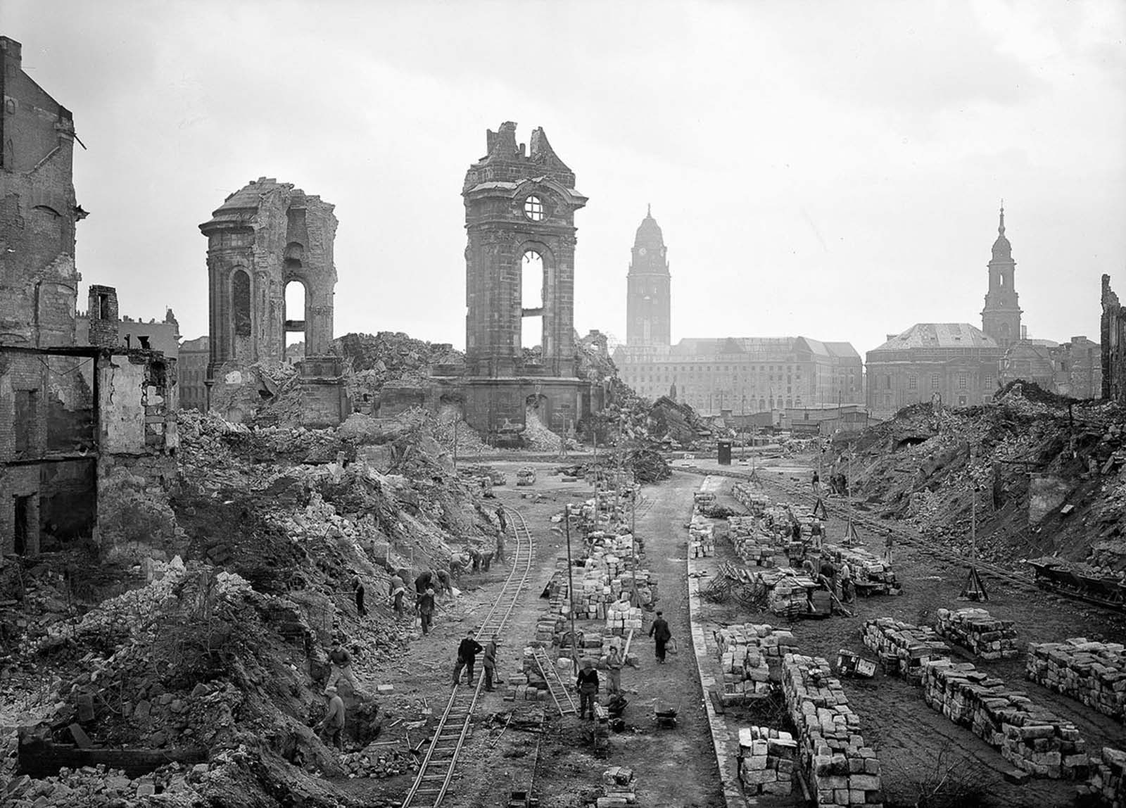 People clear rubble in front of the ruins of the Frauenkirche, 1952.