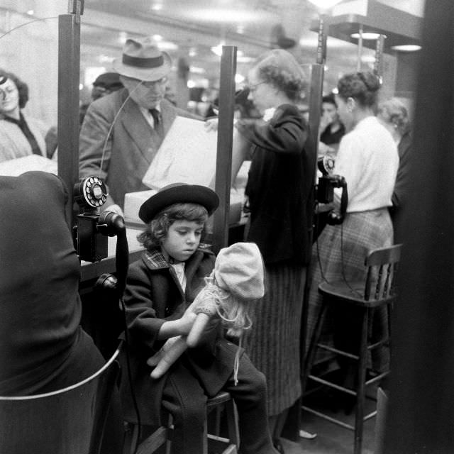 #10 A child with her doll.