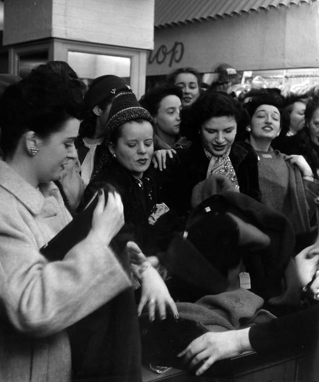 #14 Shoppers clamoring for coveted items.